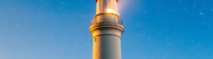 white concrete lighthouse