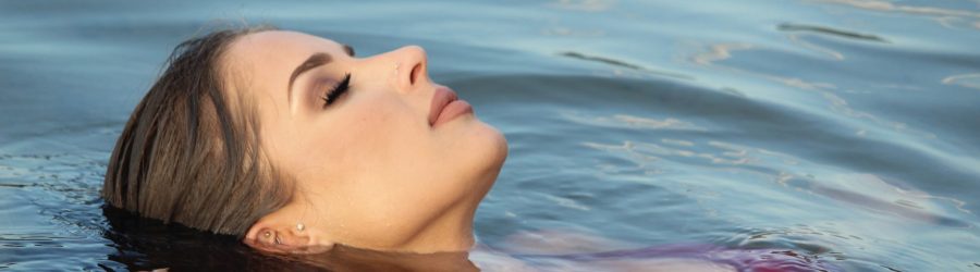 Woman swimming in pool